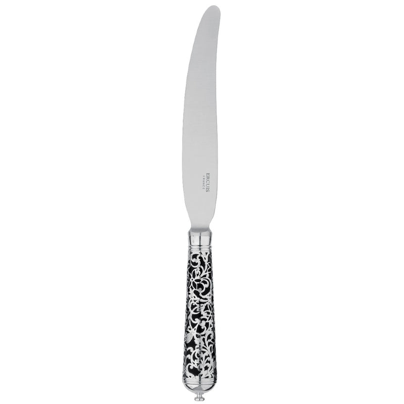 Black handle sterling silver knife with arabesque details.