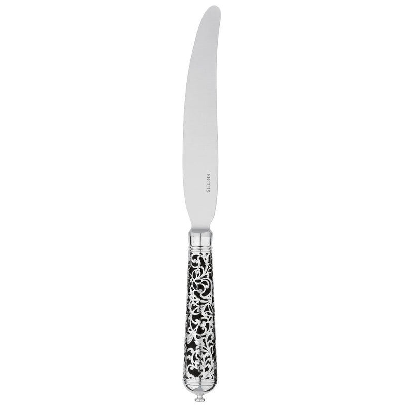 Sterling silver dessert knife with curved blade and black handle featuring elegant arabesque pattern.