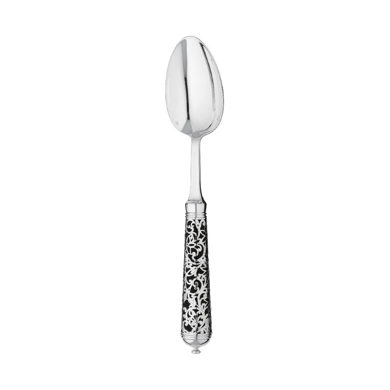 Sterling silver tea spoon with polished bowl and black handle featuring intricate arabesque detail.