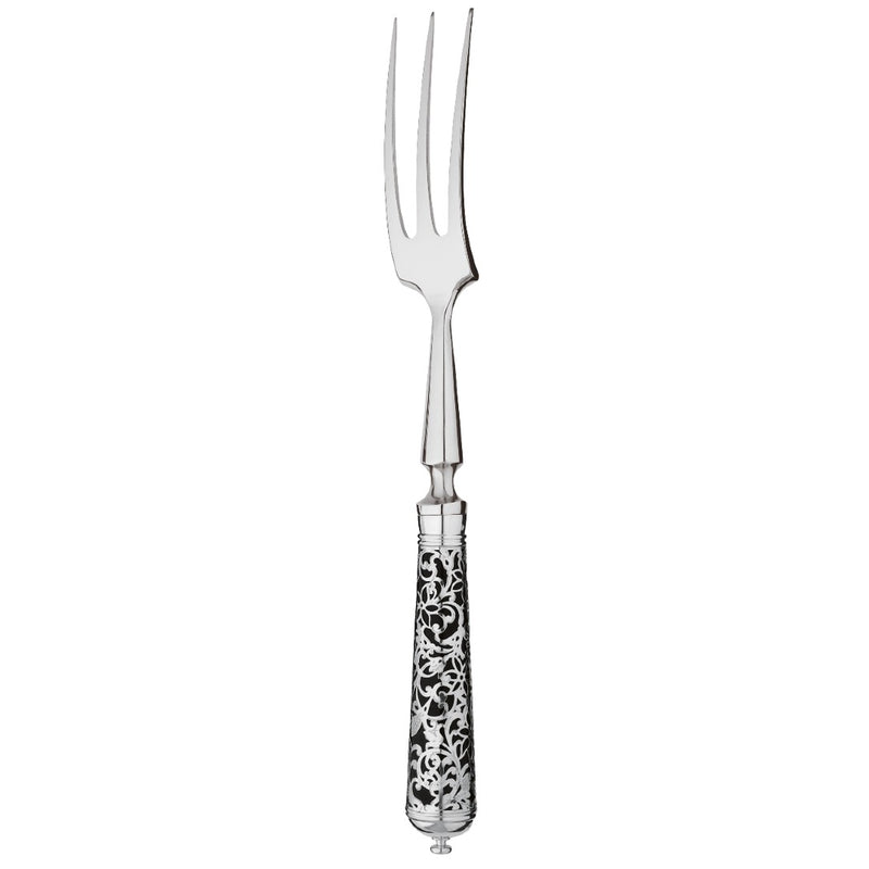 Sterling silver carving fork with long prongs and black handle decorated with silver arabesque design.
