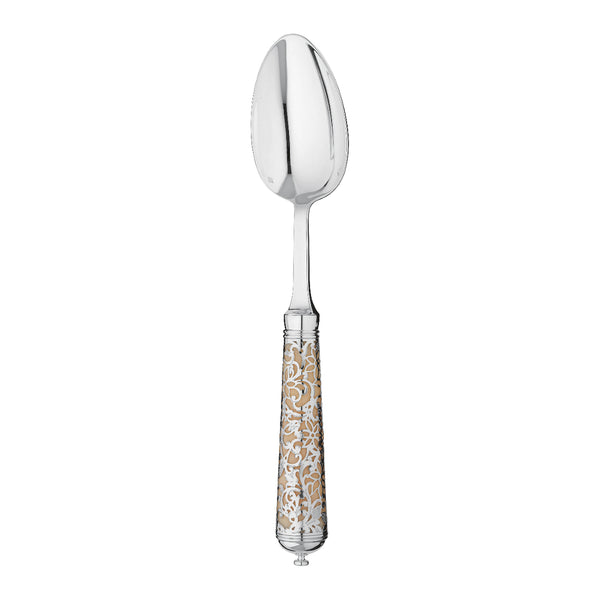 L’Insolent Ivory dessert spoon with sterling silver bowl and arabesque handle on elegant table.