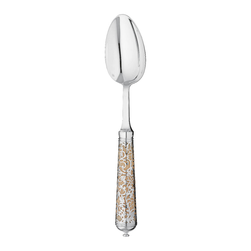 L’Insolent Ivory dessert spoon with sterling silver bowl and arabesque handle on elegant table.