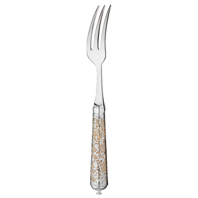 L’Insolent Ivory individual salad fork with sterling silver arabesque handle on table.