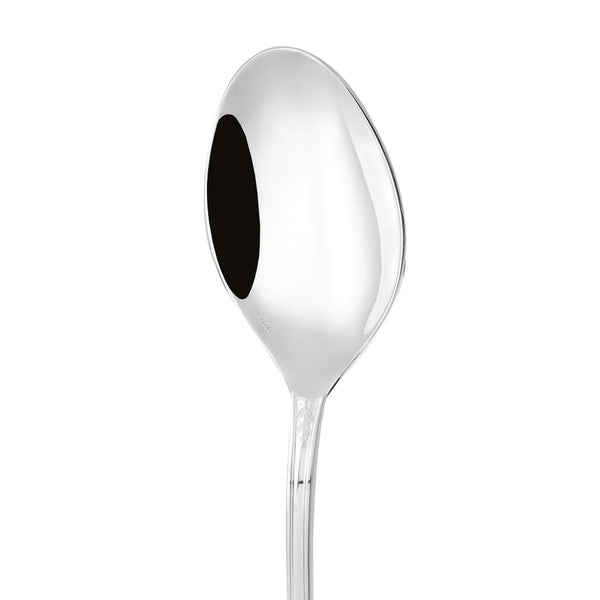 Serving spoon Lauriers silver plated close-up on its bowl.