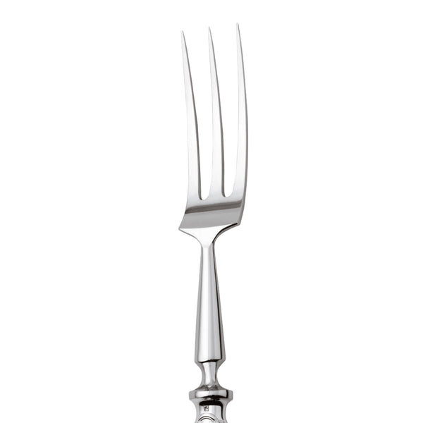 Carving fork Lauriers silver plated close-up o sharp tines.