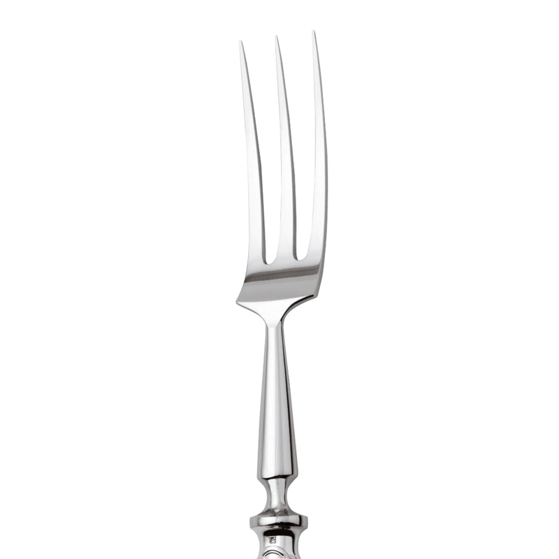 Carving fork Lauriers silver plated close-up o sharp tines.