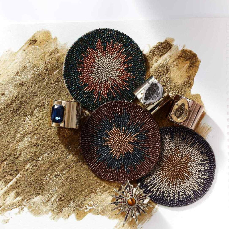 Joanna Buchanan navy ombré beaded drink coasters styled with luxury napkin rings