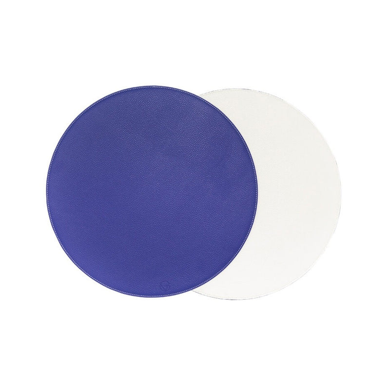 Reversible placemat in blue and white faux leather by Von Gern Home.