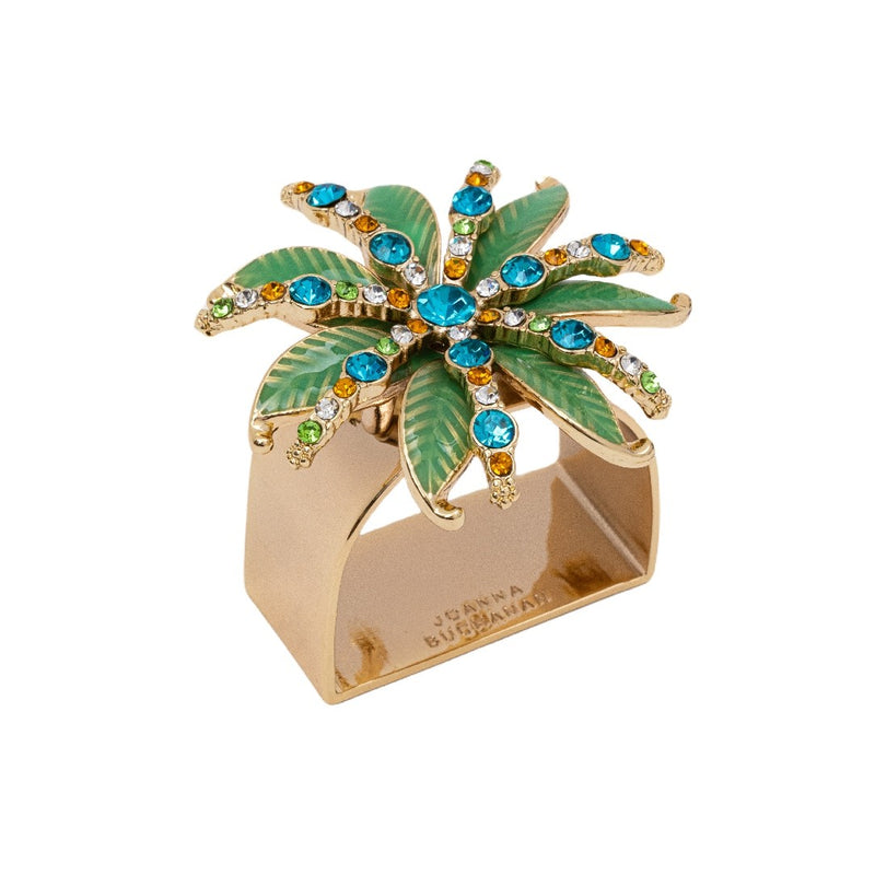 Palm tree napkin ring by Joanna Buchanan on a white background.