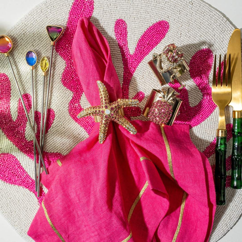 Starfish Napkin Ring on fuchsia napkin, styled with Joanna Buchanan’s summer table collection
