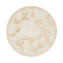 Natural palm frond round placemat with straw-like texture by Joanna Buchanan.