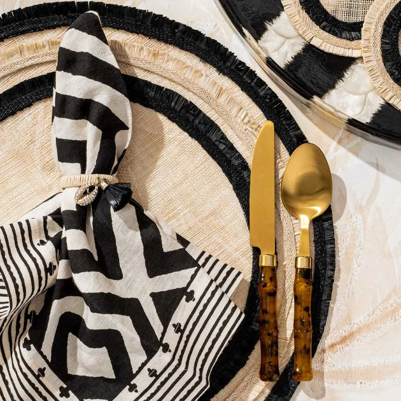 beige and black Ruffle Edge Straw Placemats with handwoven texture by Joanna Buchanan close-up.