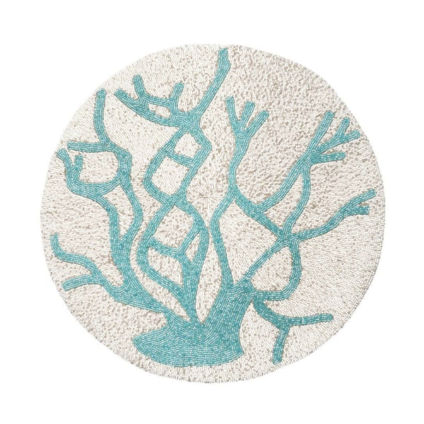 Turquoise coral placemat with intricate detailing by Joanna Buchanan.