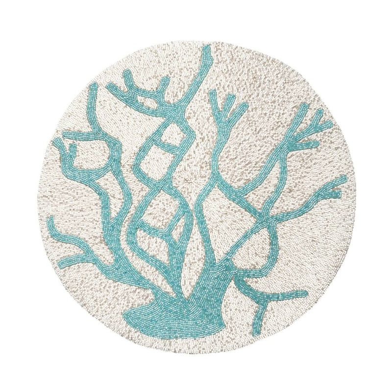Turquoise coral placemat with intricate detailing by Joanna Buchanan.