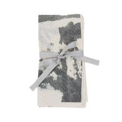 Set of two Grey Brushstroke napkins by Joanna Buchanan folded on white background.