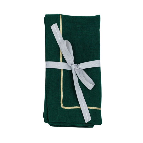 Hunter green linen napkin with gold trim folded on white background, sold at Amiramour.