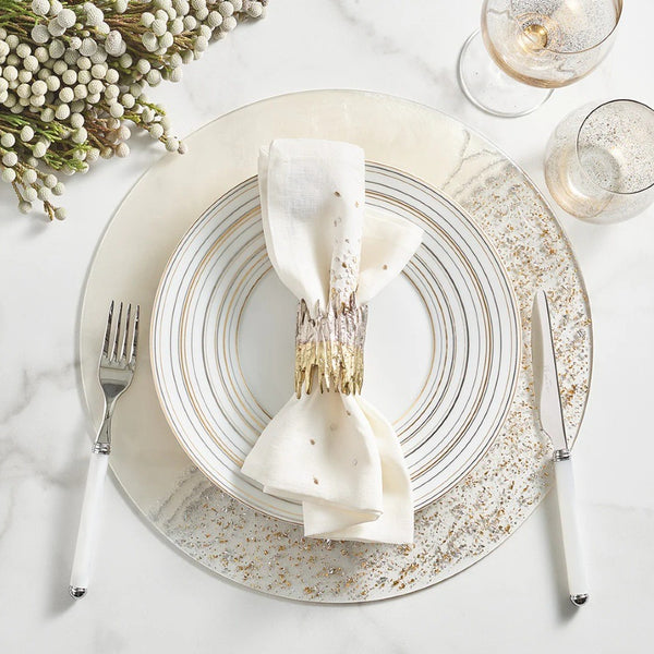 Elegant table setting with Patina Napkin Ring by Kim Seybert in soft cream, gold, silver tones