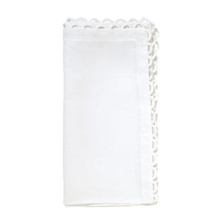 White linen napkins by Kim Seybert, featuring delicate looped edges