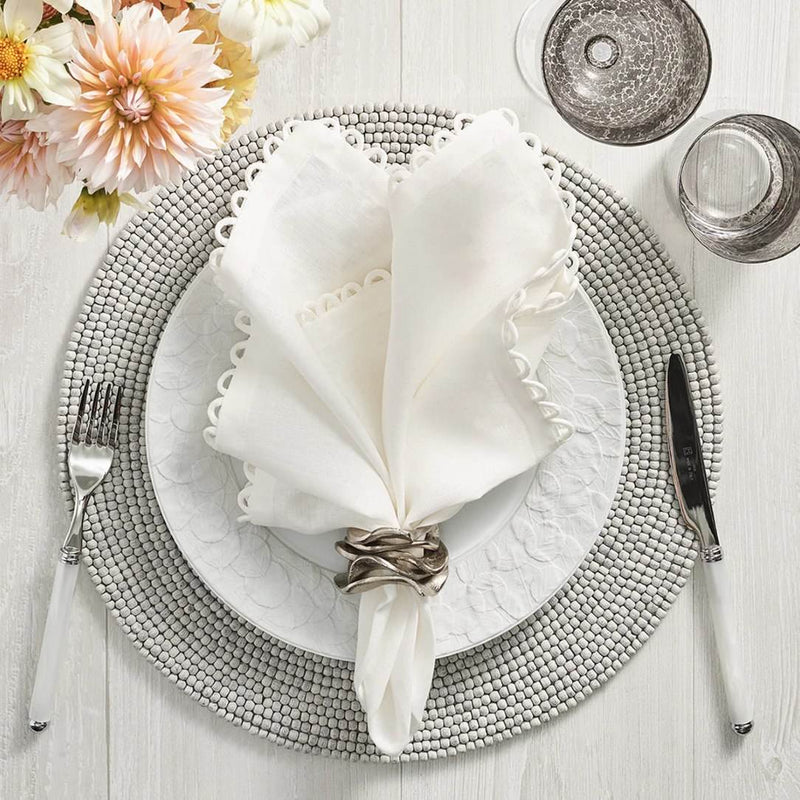 Loop Edge white napkins by Kim Seybert, top view
