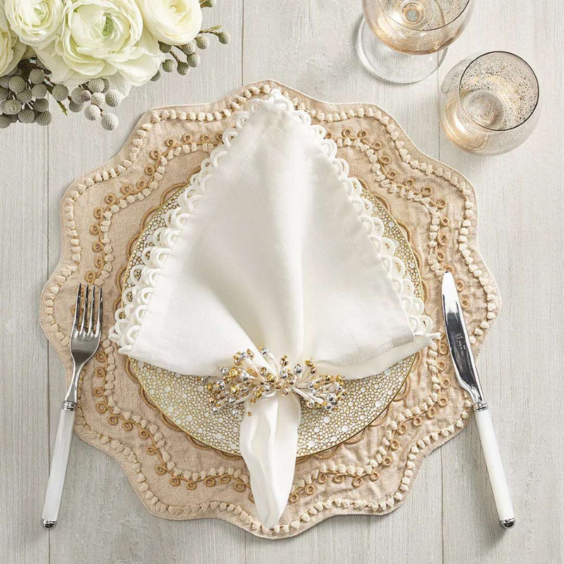 Loop Edge white napkins by Kim Seybert, styled with beige placemat