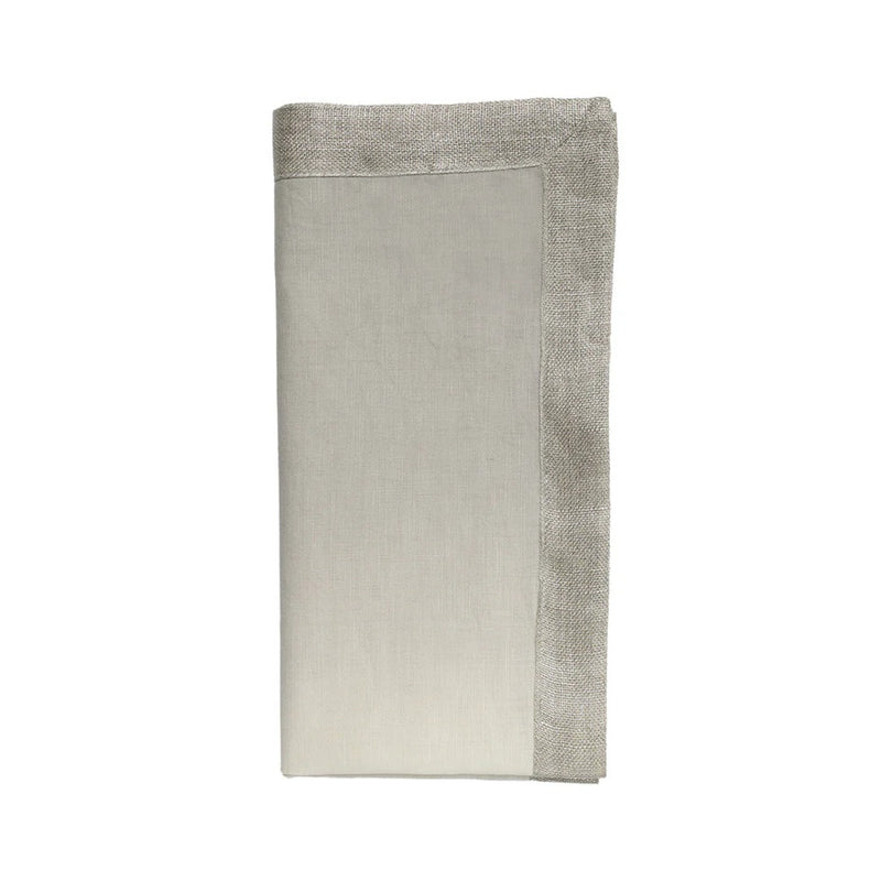 Folded Dip Dye napkins in gray and silver ombré by Kim Seybert on a white background.