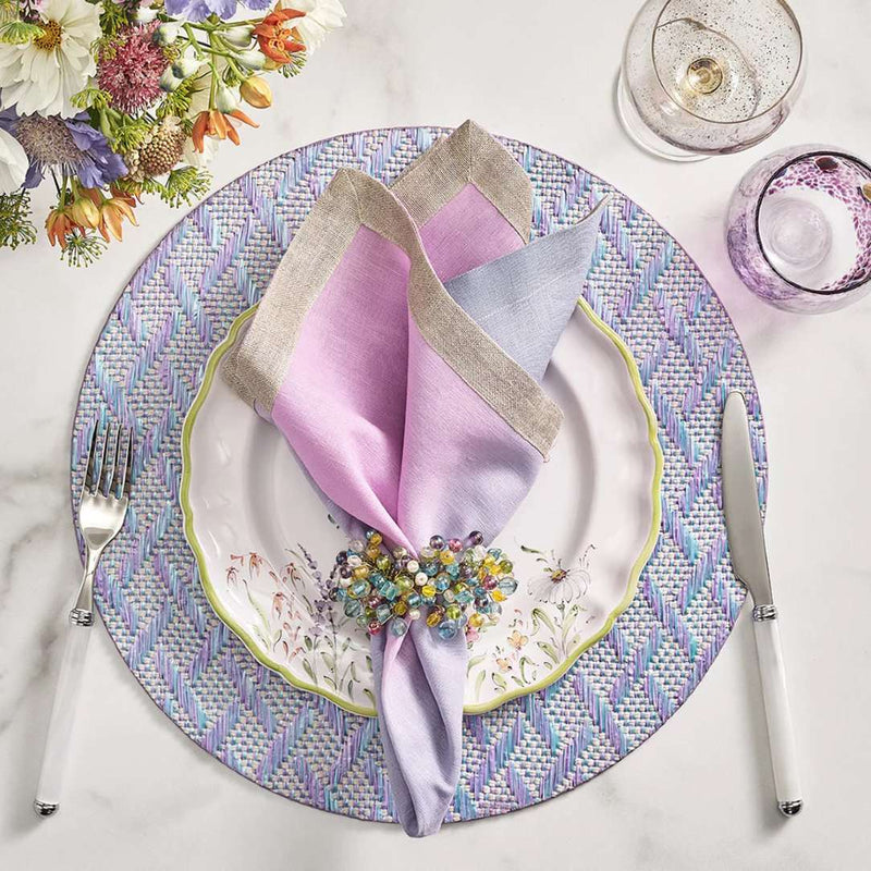Ombre napkin in lilac and periwinkle styled on purple placemat, sold at Amiramour.