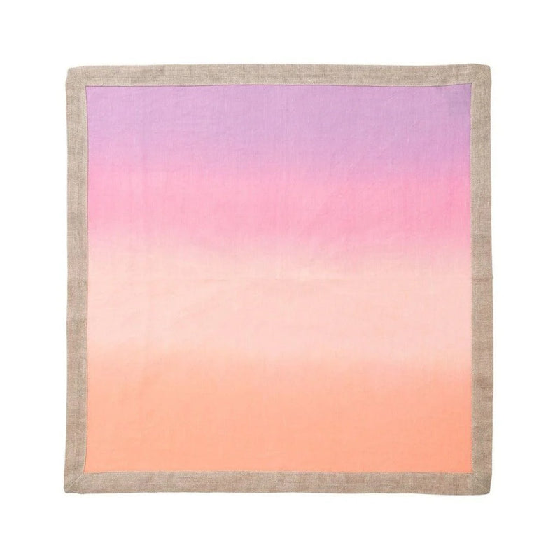 Ombre napkin in lilac and soft orange by Kim Seybert unwraped on white background.