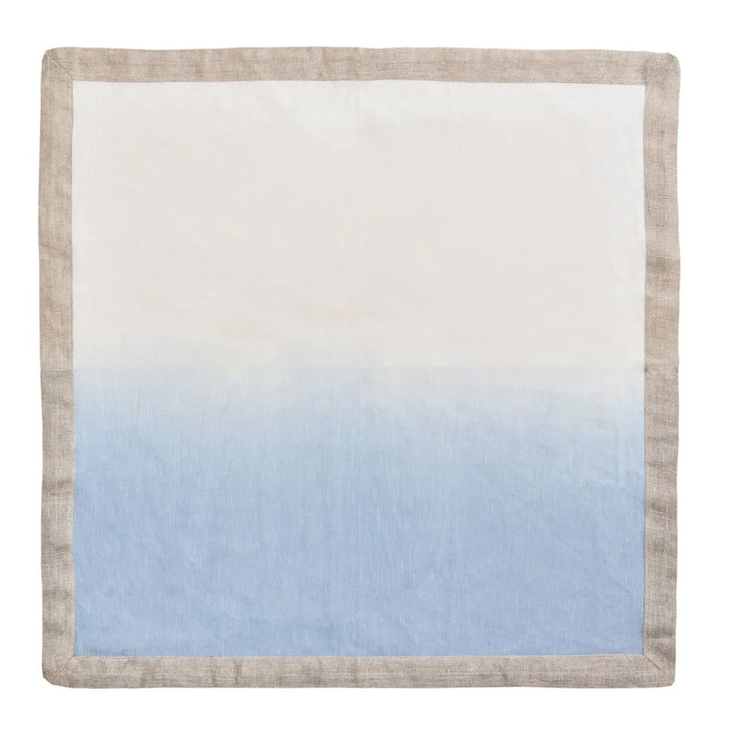 Unwraped periwinkle and white ombré linen napkin on white background by Kim Seybert, sold on Amirammour
