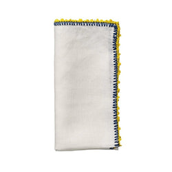 Knotted Edge napkin in white with blue and yellow trim on white background, Amiramour