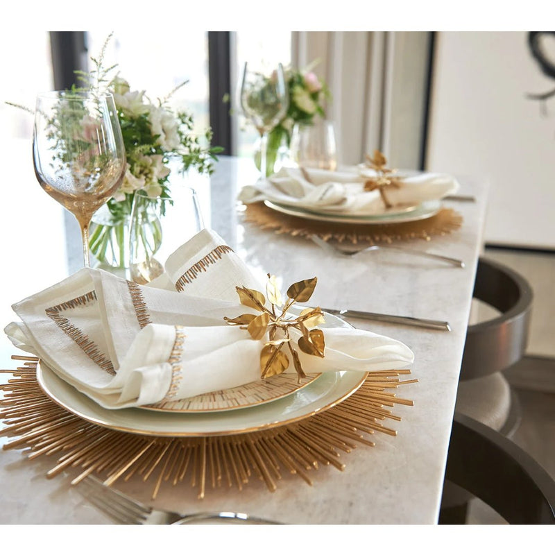 Styled Filament linen napkin in white with gold and silver embroidery by Kim Seybert