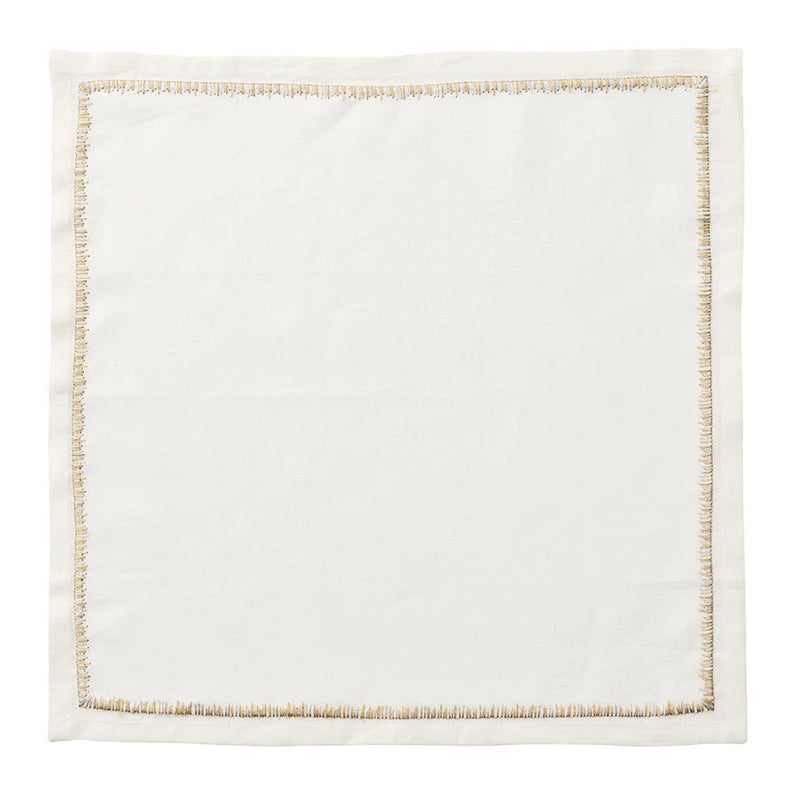 Filament linen napkin in white with gold and silver embroidery by Kim Seybert unwraped