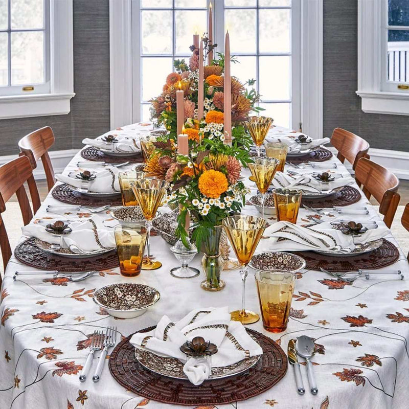 Filament napkin styled on autumnal white and brown table setting, full table view