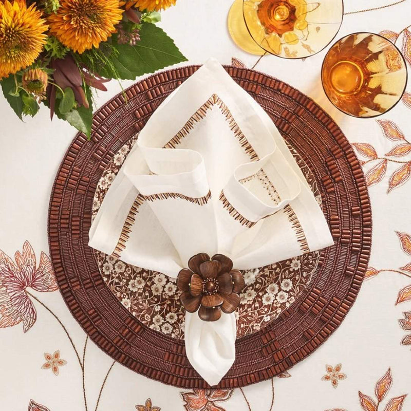 Filament napkin styled on brown placemat, top view, sold at Amiramour