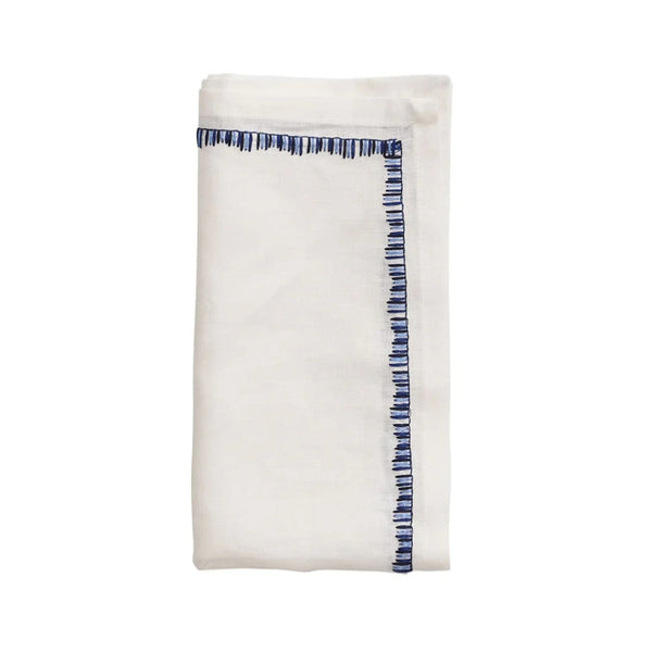 Filament napkin in white and navy by Kim Seybert on white background, available at Amiramour