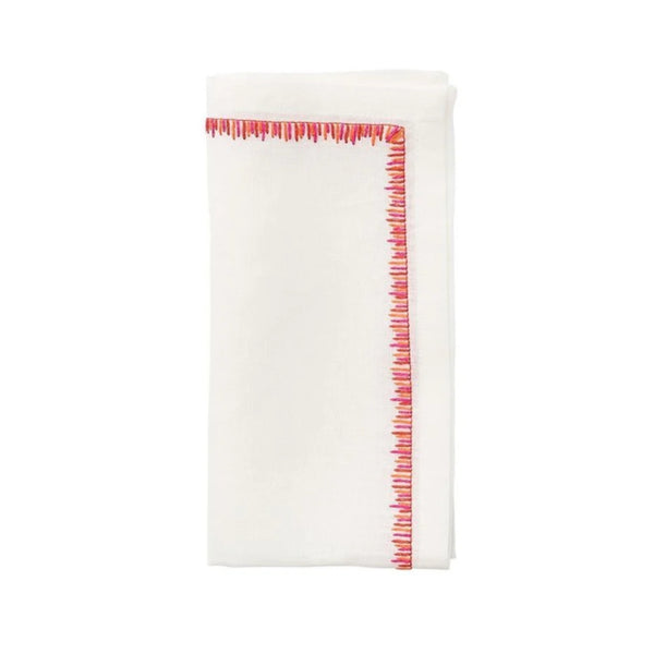 Folded Filament napkin in white linen with floating pink and orange embroidery