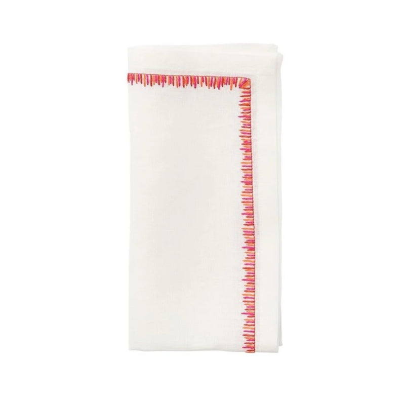 Folded Filament napkin in white linen with floating pink and orange embroidery