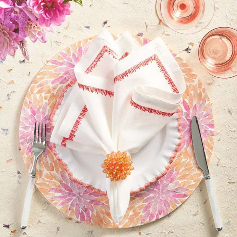 Filament napkin styled on a blush and coral placemat top view shown by Amiramour