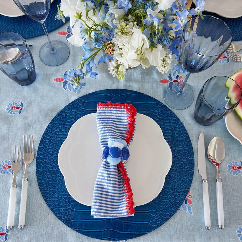 Top View forth of July table setting featuring Seersucker striped napkin by Kim Seybert