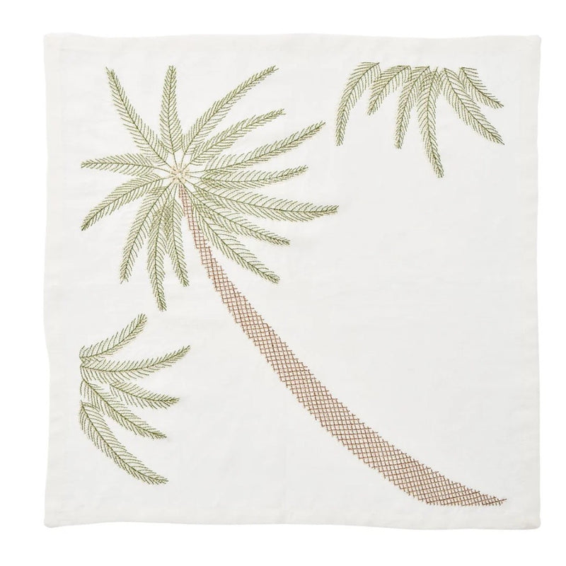 Unfolded Palm Coast napkin in white linen with palm motif embroidery in green and gold