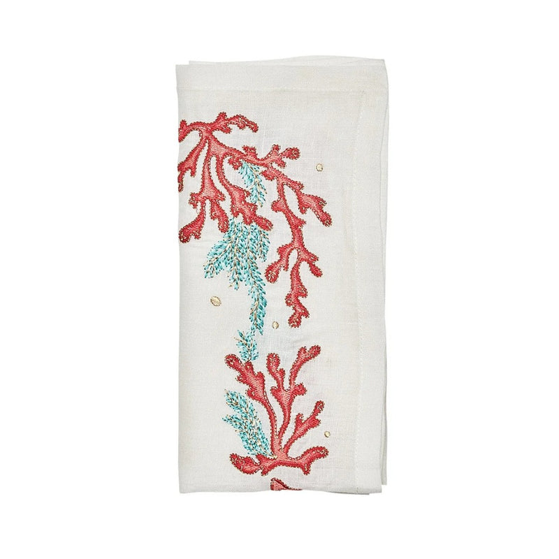 Folded Coral Spray napkin in white with coral and turquoise embroidery by Kim Seybert, available at Amiramour