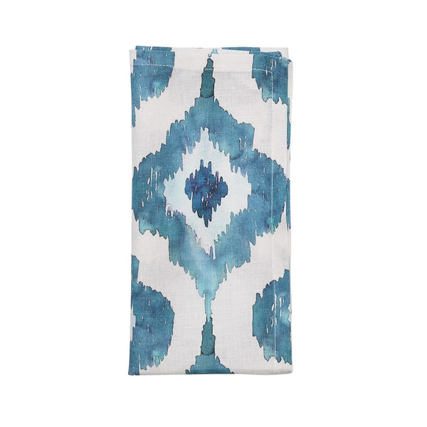 Blue Watercolor Ikat linen napkin by Kim Seybert folded on white background, sold at Amiramour.