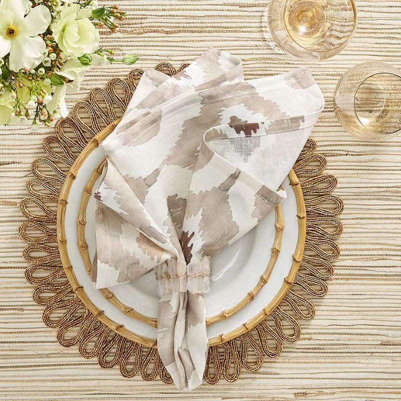 Watercolor Ikat napkin in taupe by Kim Seybert styled in a casual, boho table setting