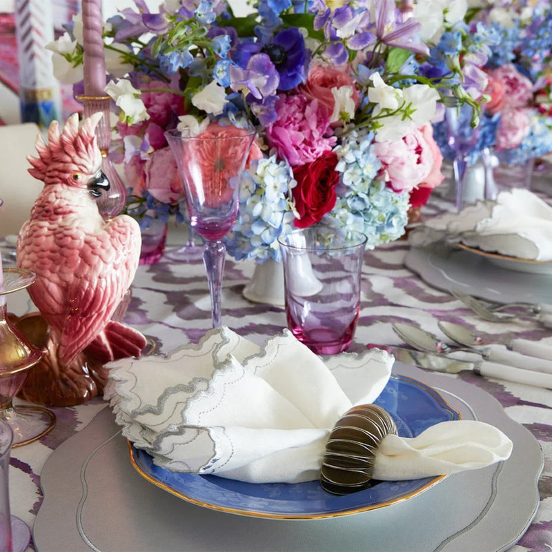 Side view of daytime table setting with Arches napkin 