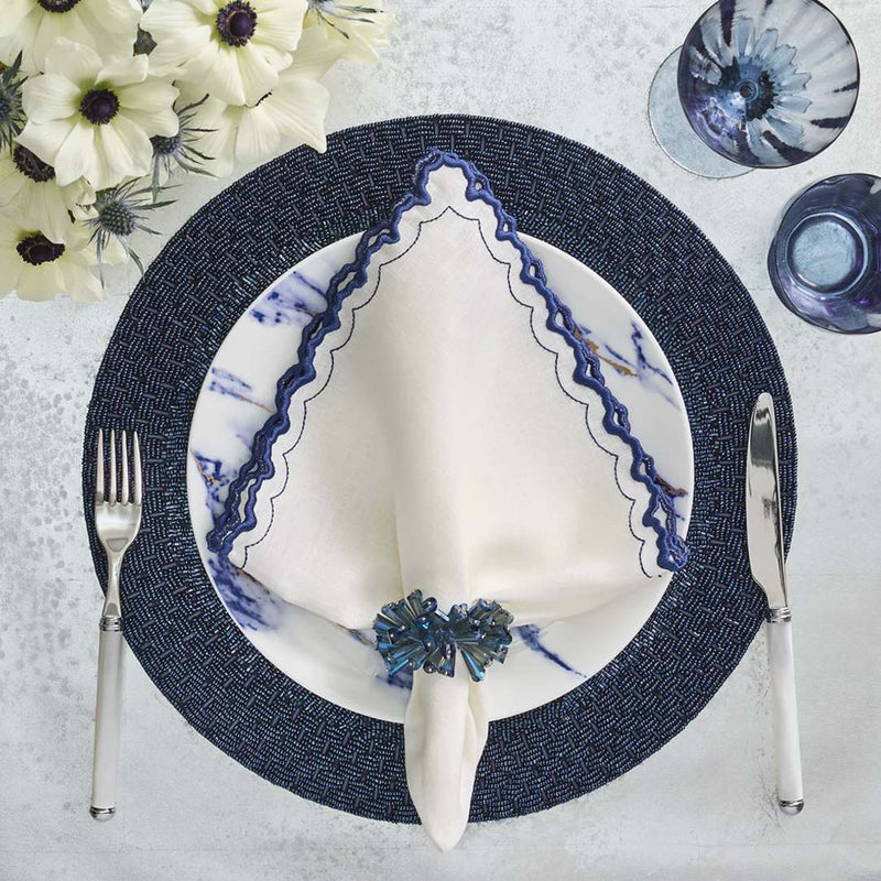 Glam top view with Arches napkin, crystal napkin ring, and beaded placemat, sold by Amiramour