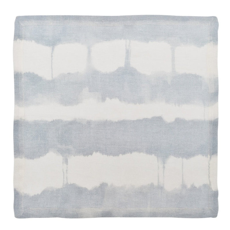 Watercolor stripe napkin in white, blue, and grey tones by Kim Seybert unwrapped