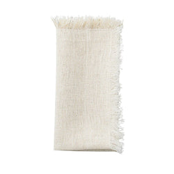Folded Fringe napkin in white linen with gold lurex threads and fringe edge by Kim Seybert, available at Amiramour