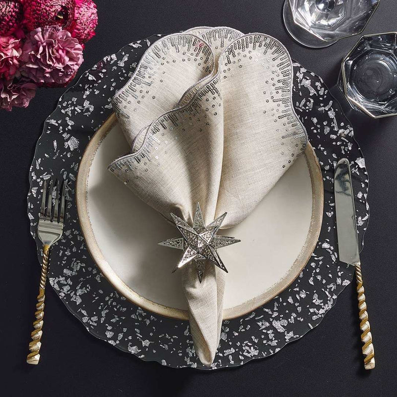 Sequin Spray napkin styled on an elegant holiday table with silver shiny accents, top view 