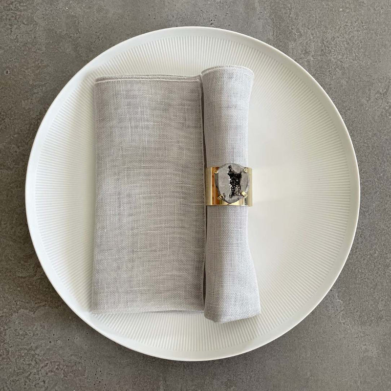 Garza napkin in grey styled with druzy stone napkin ring top view 
