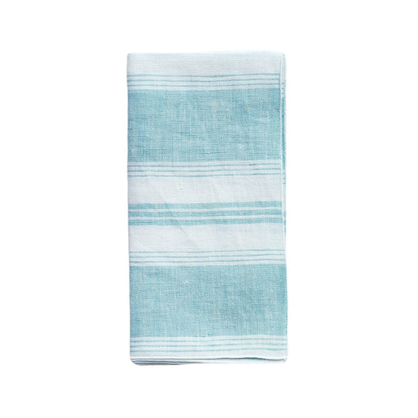 Folded Riva turquoise and white striped linen napkin with piped edge on white background, solld by Amiramour