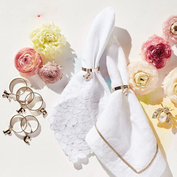 Gold Trim Linen Napkin In White by Joanna Buchanan styled with gold band napkin ring